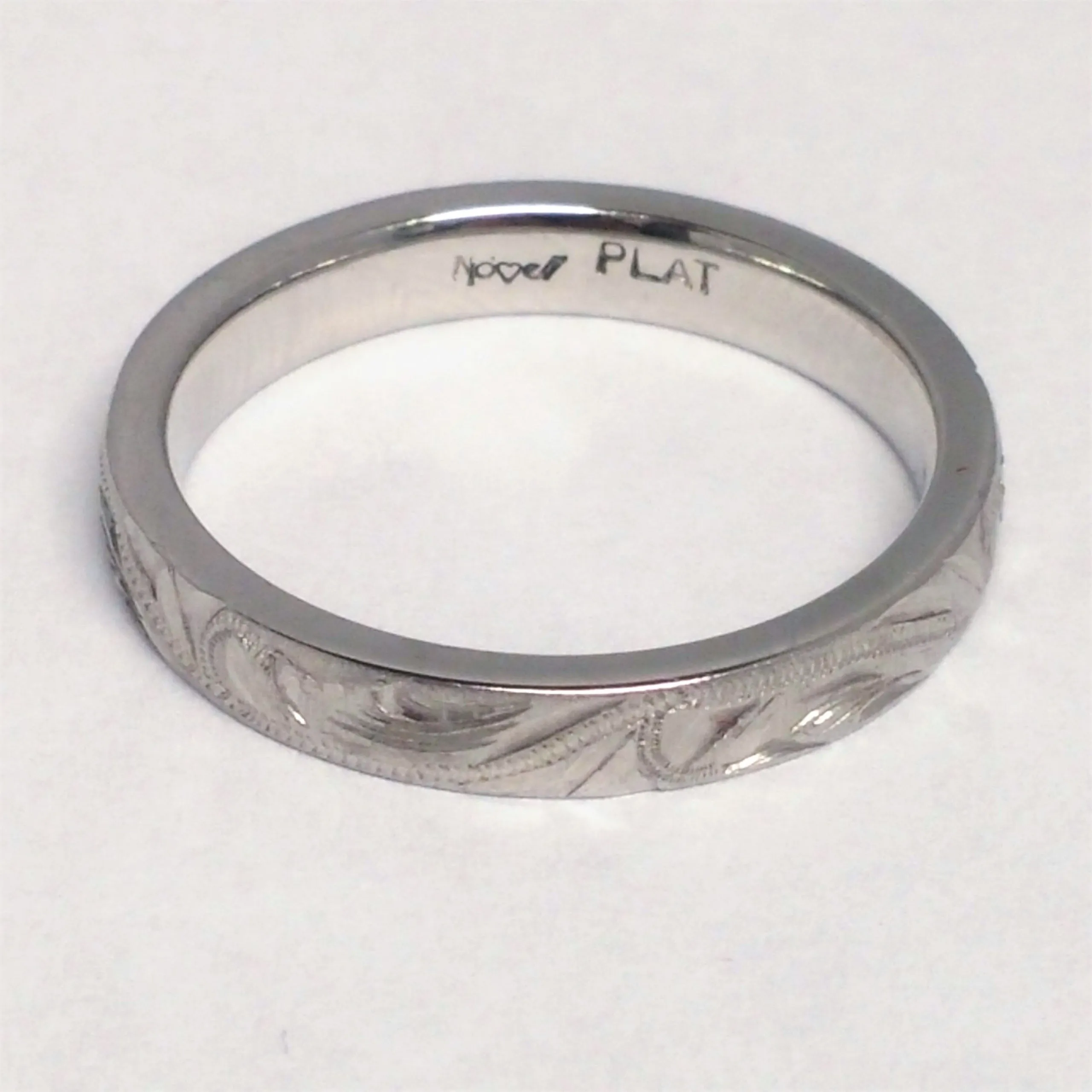 Novell Platinum Engraved Band